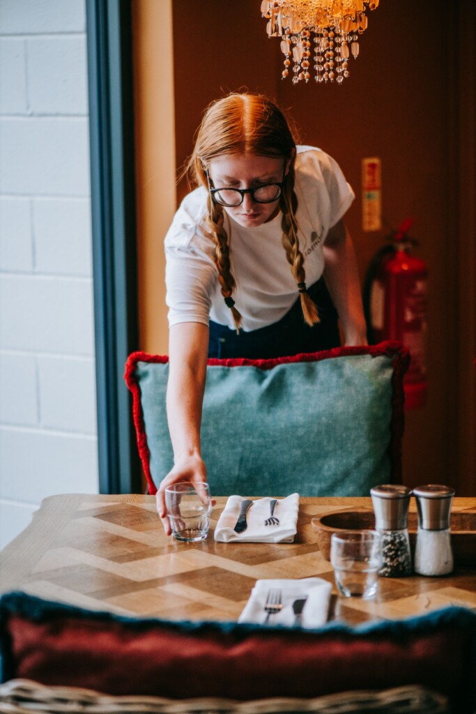 Tidehouse waitress dressing tables overlooking the Whitstable coast.